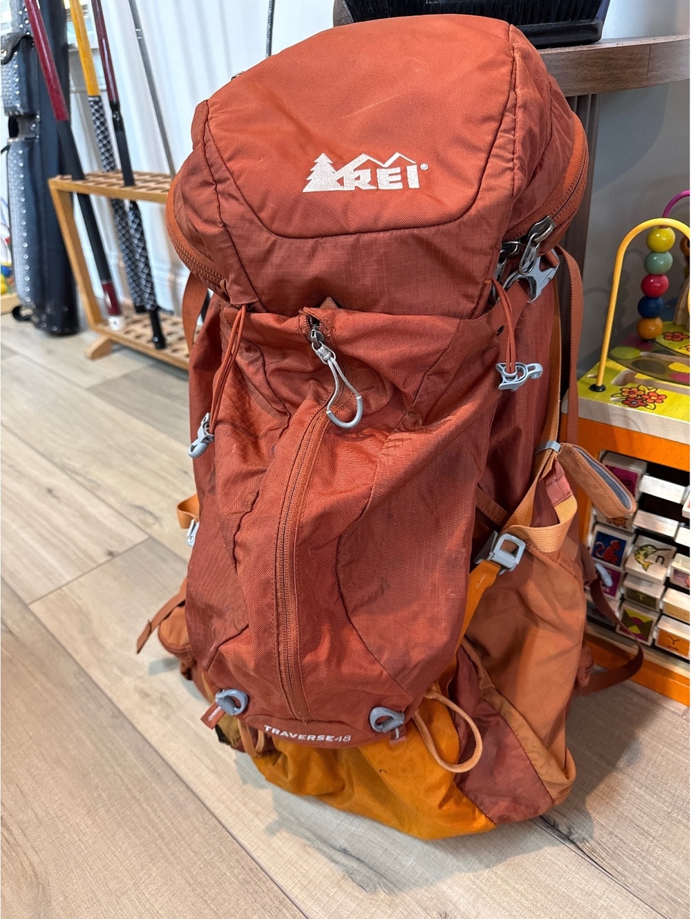 REI Traverse 48 Hiking Backpack in Rust Orange